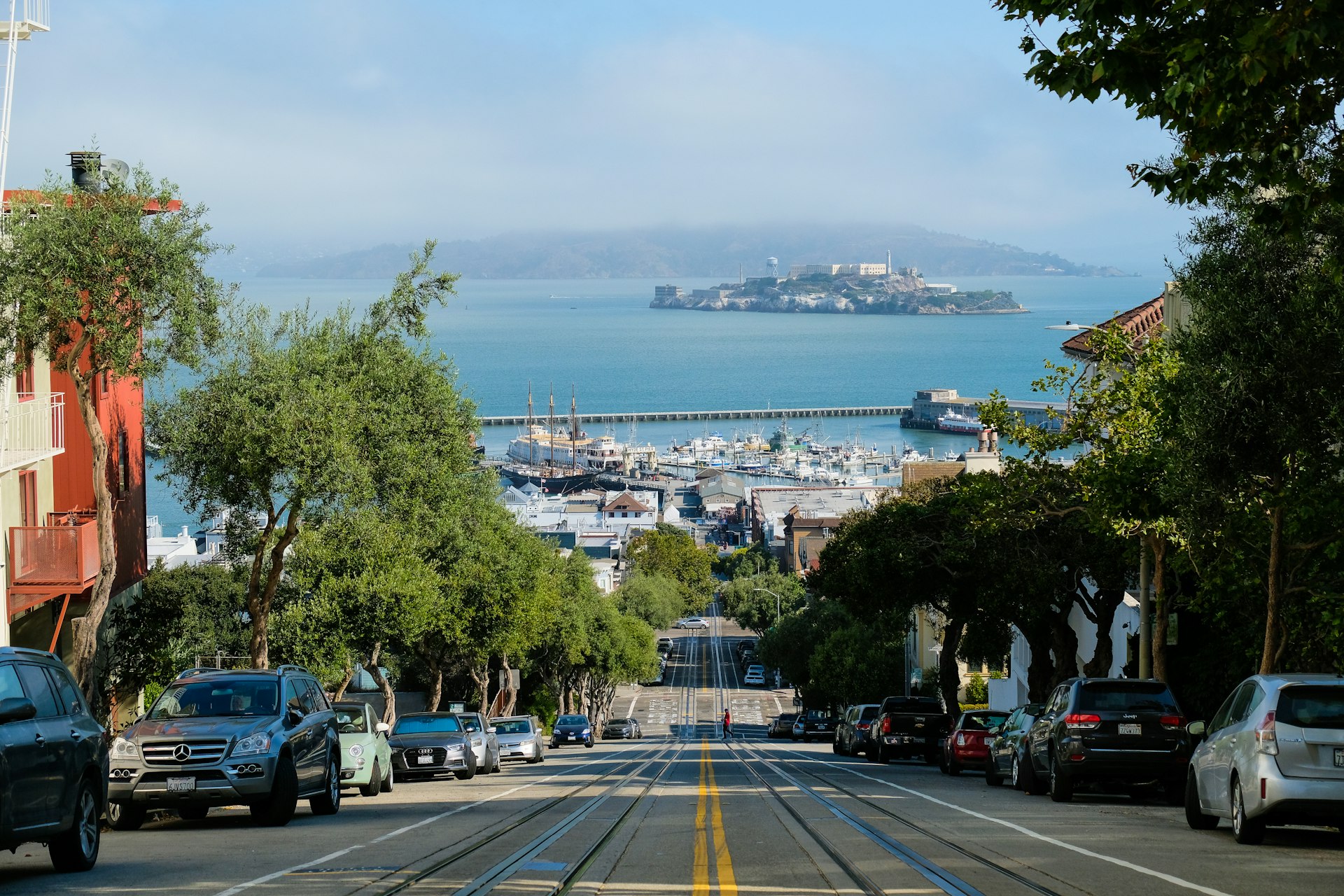 View of Alcatraz down a steep street in San Francisco, California