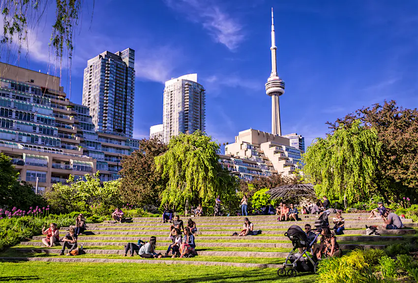 shutterstockRF_1435134179.jpg Visitors seated in the Toronto Music Garden on a sunny day