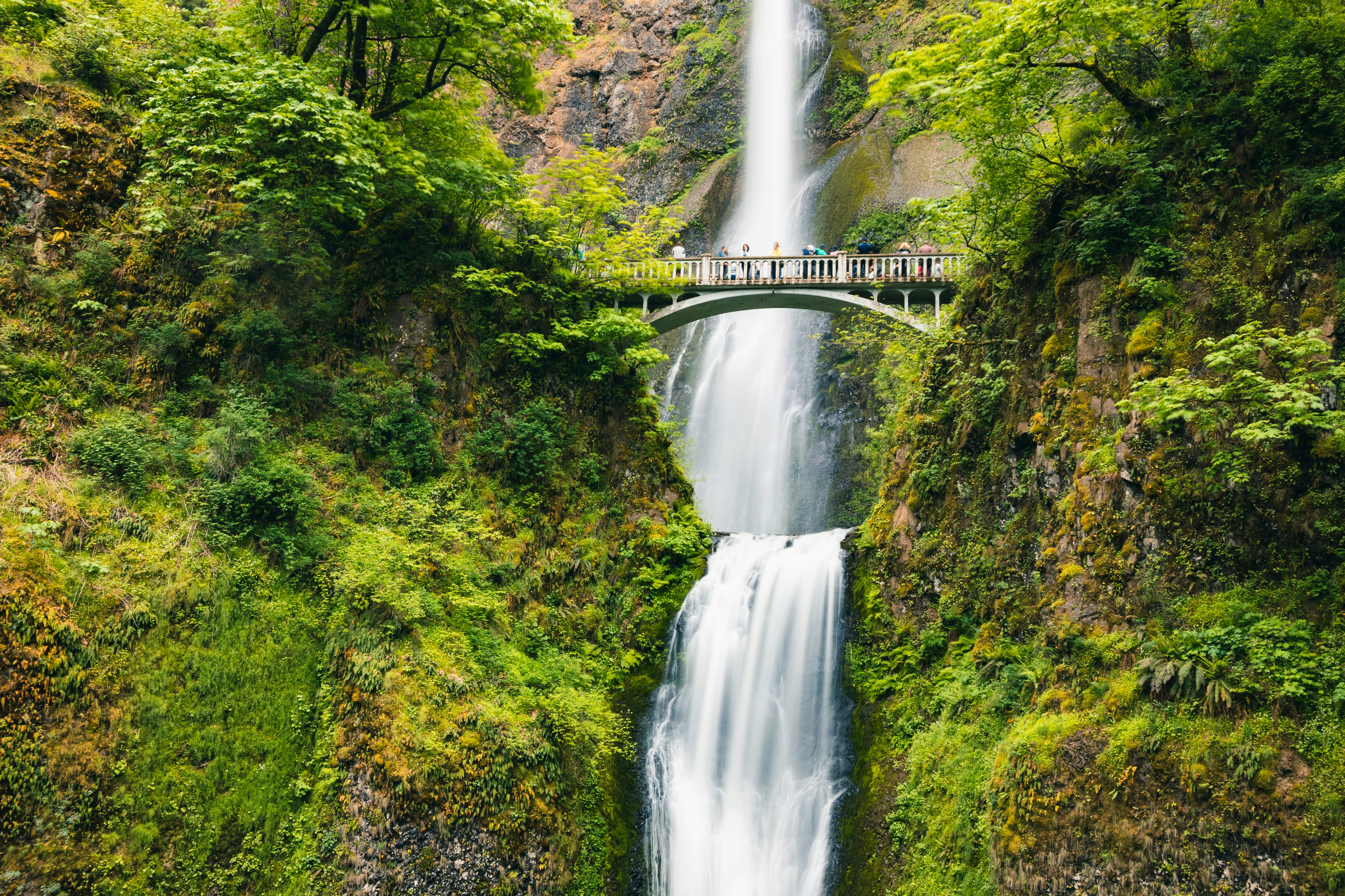 Visitors on a bridge at Multnomah Falls in the Columbia River Gorge, Oregon