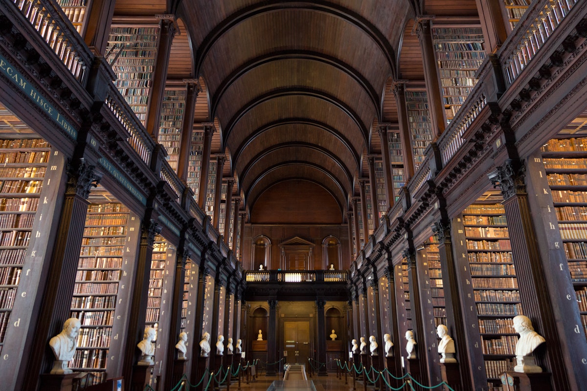 DUBLIN, IRELAND - FEB 15: The Long Room in the Trinity College Library on Feb 15, 2014 in Dublin, Ireland. Trinity College Library is the largest library in Ireland and home to The Book of Kells.
