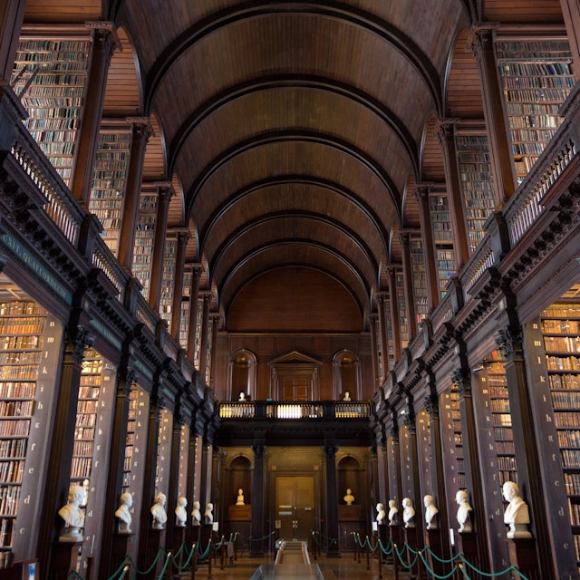 DUBLIN, IRELAND - FEB 15: The Long Room in the Trinity College Library on Feb 15, 2014 in Dublin, Ireland. Trinity College Library is the largest library in Ireland and home to The Book of Kells.