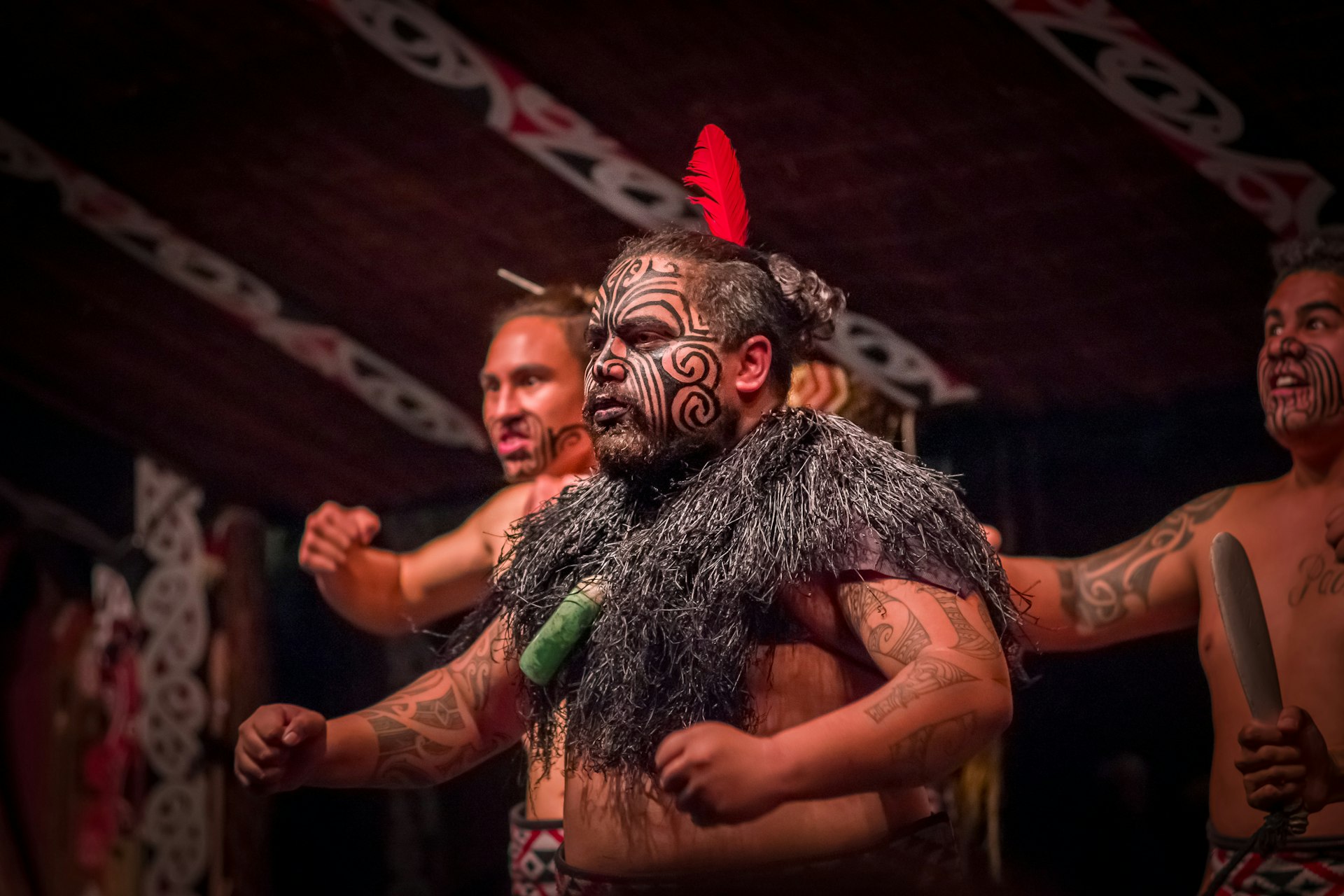 A Tamaki Maori leader dancing in traditional dress. 