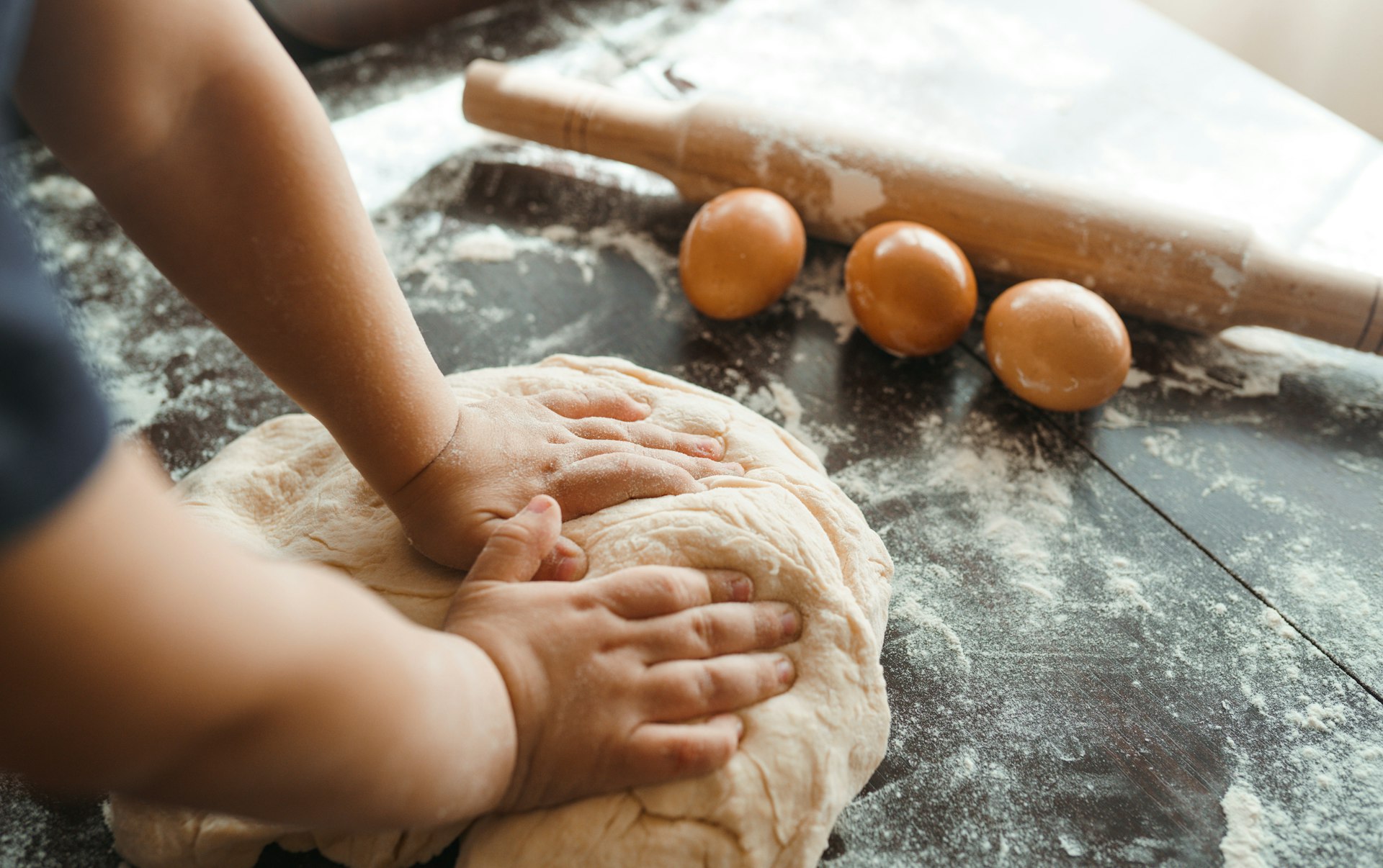 Small,Hands,Kneading,Dough.,Little,Child,Preparing,Dough,For,Backing.