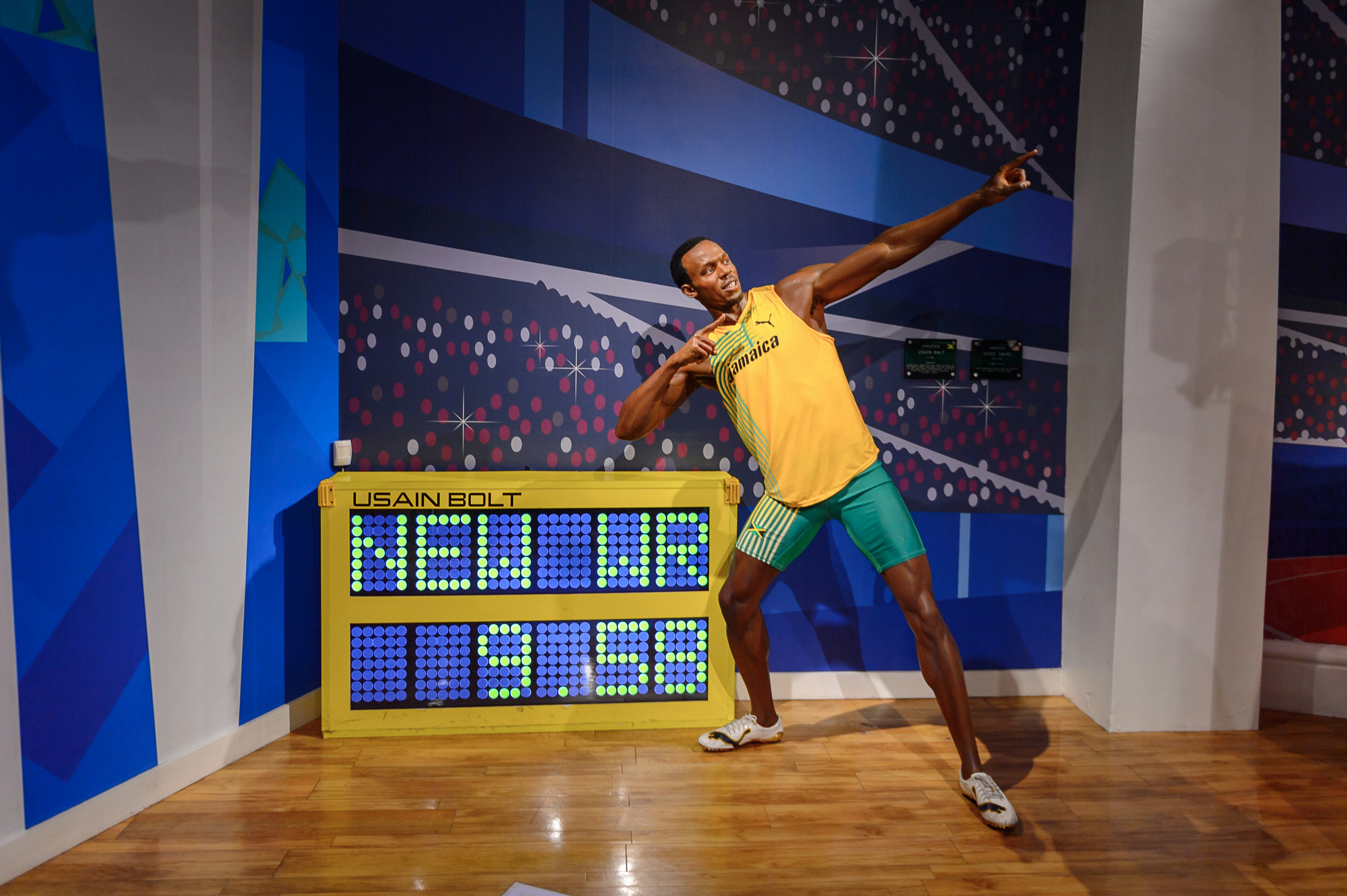 LONDON, ENGLAND - JULY 22, 2016: Jamaican runner Usaine Bolt,  Madame Tussauds wax museum. It is a major tourist attraction in London; Shutterstock ID 460048255; Your name (First / Last): Claire Naylor; GL account no.: 65050; Netsuite department name: Online-Editorial; Full Product or Project name including edition: London with kids article