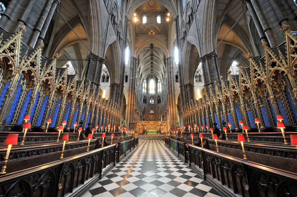 A stunning shot through a church quire, with black-and-white tiled floors and huge vaulted ceilings