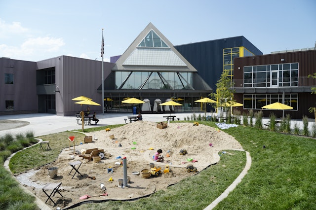 Kids in the sandpit at the Children's Museum of Denver