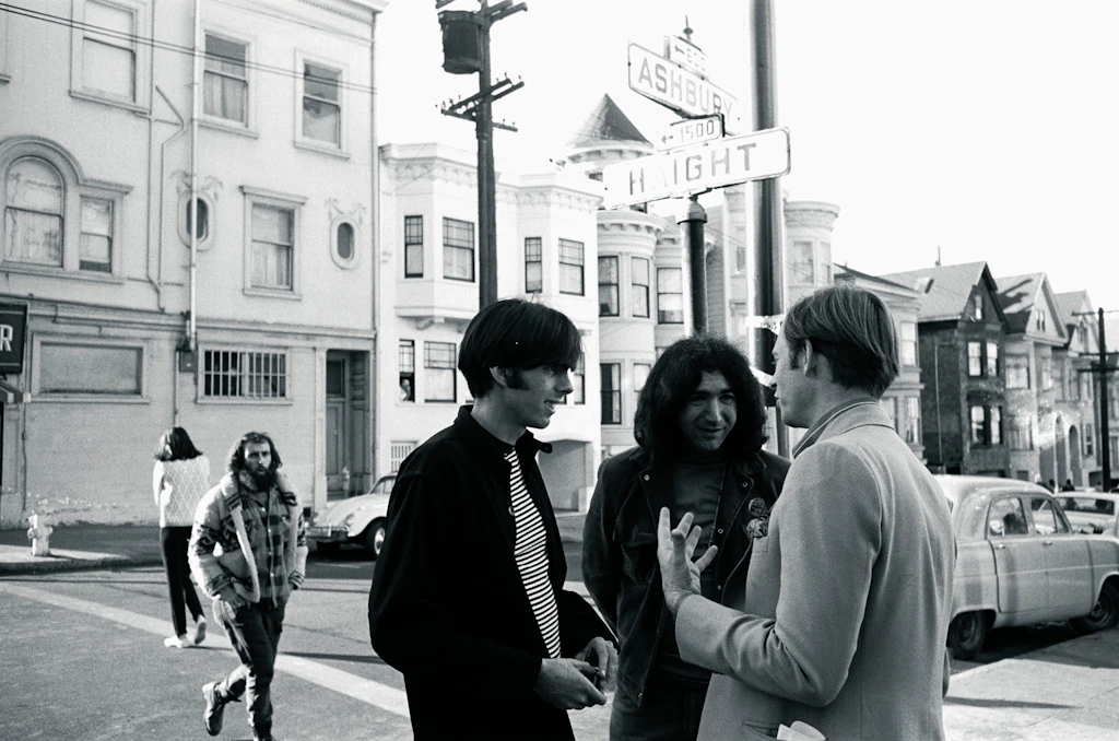 Scully, Garcia, and Wolfe Talking on the Sidewalk
