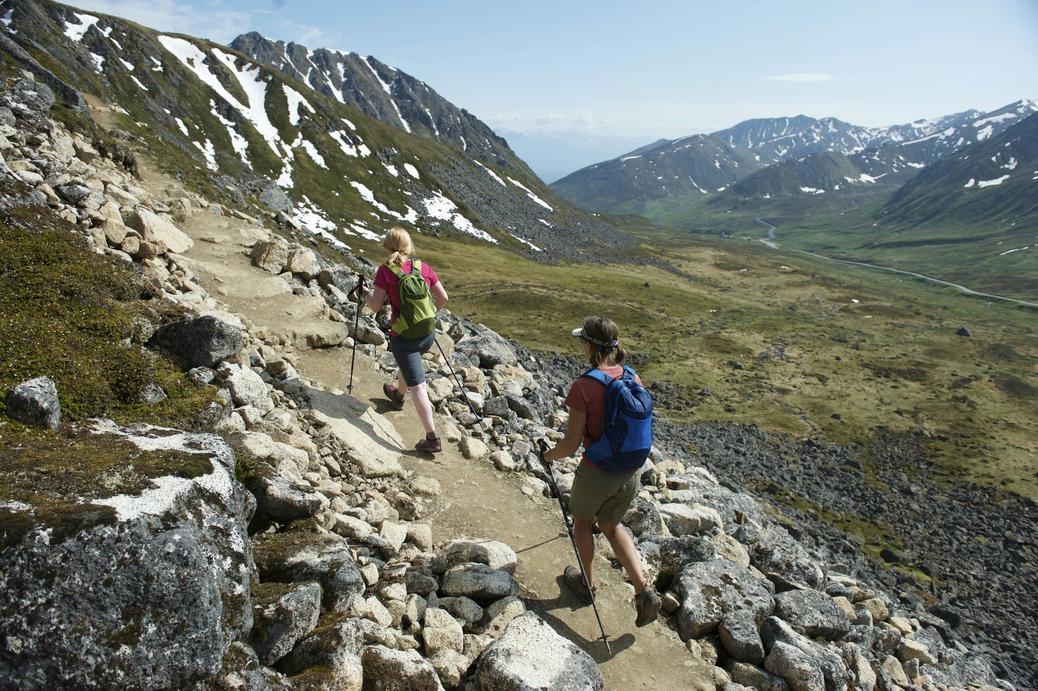 Hikers on the trail to Gold Cord Lake in Independence Mine State Historical Park at Hatcher Pass, Alaska June 2011. The half-mile trail leads to an alpine lake above the historic gold mine near Hatcher Pass.