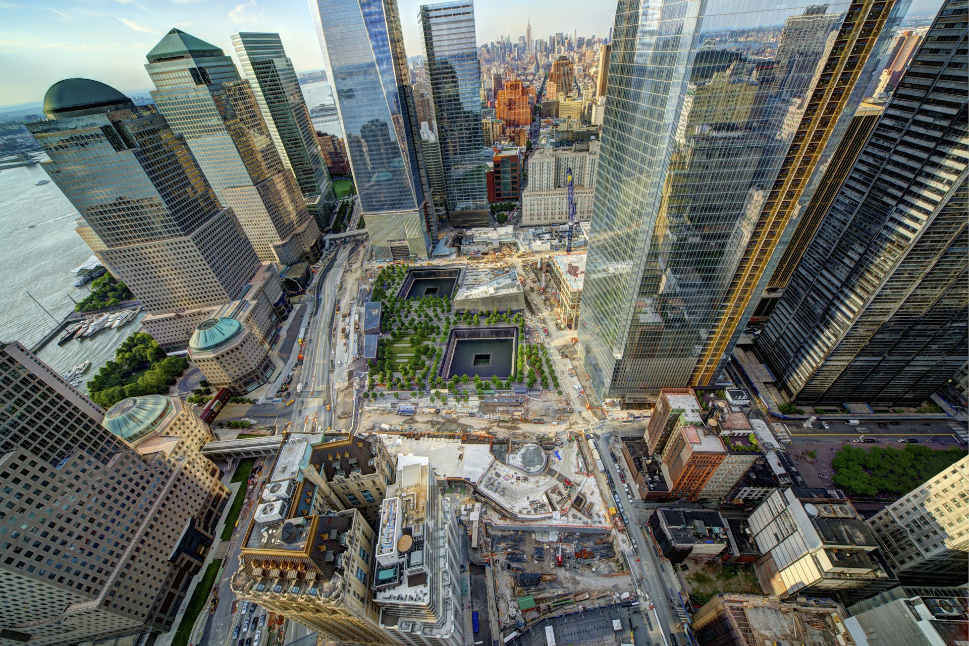A photo from above of the glass buildings of the One World Trade Center