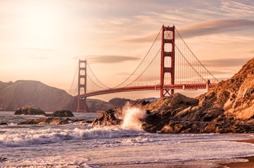 Golden Gate Bridge at the golden hour from Baker Beach.
