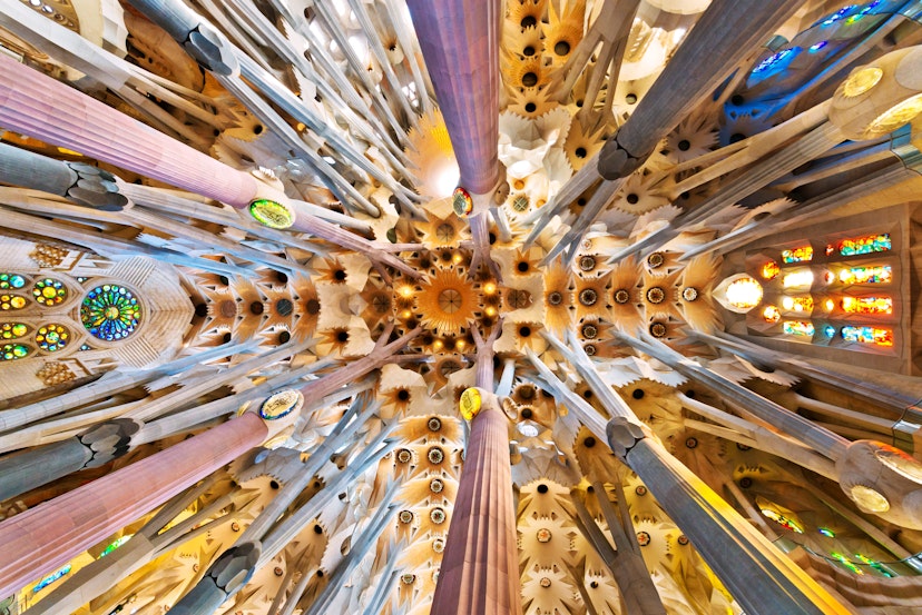 The church ceiling inside of La Sagrada Familia.