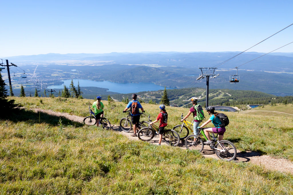 A family rides their bikes in Whitefish, Montana. A family rides their bikes in Whitefish, Montana.