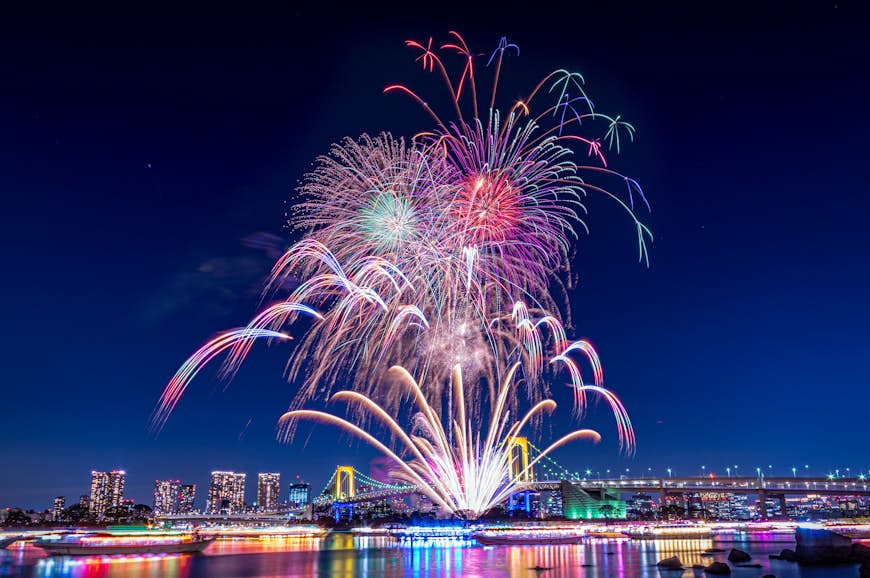 Firework display at Odaiba Rainbow Bridge in Tokyo, Japan