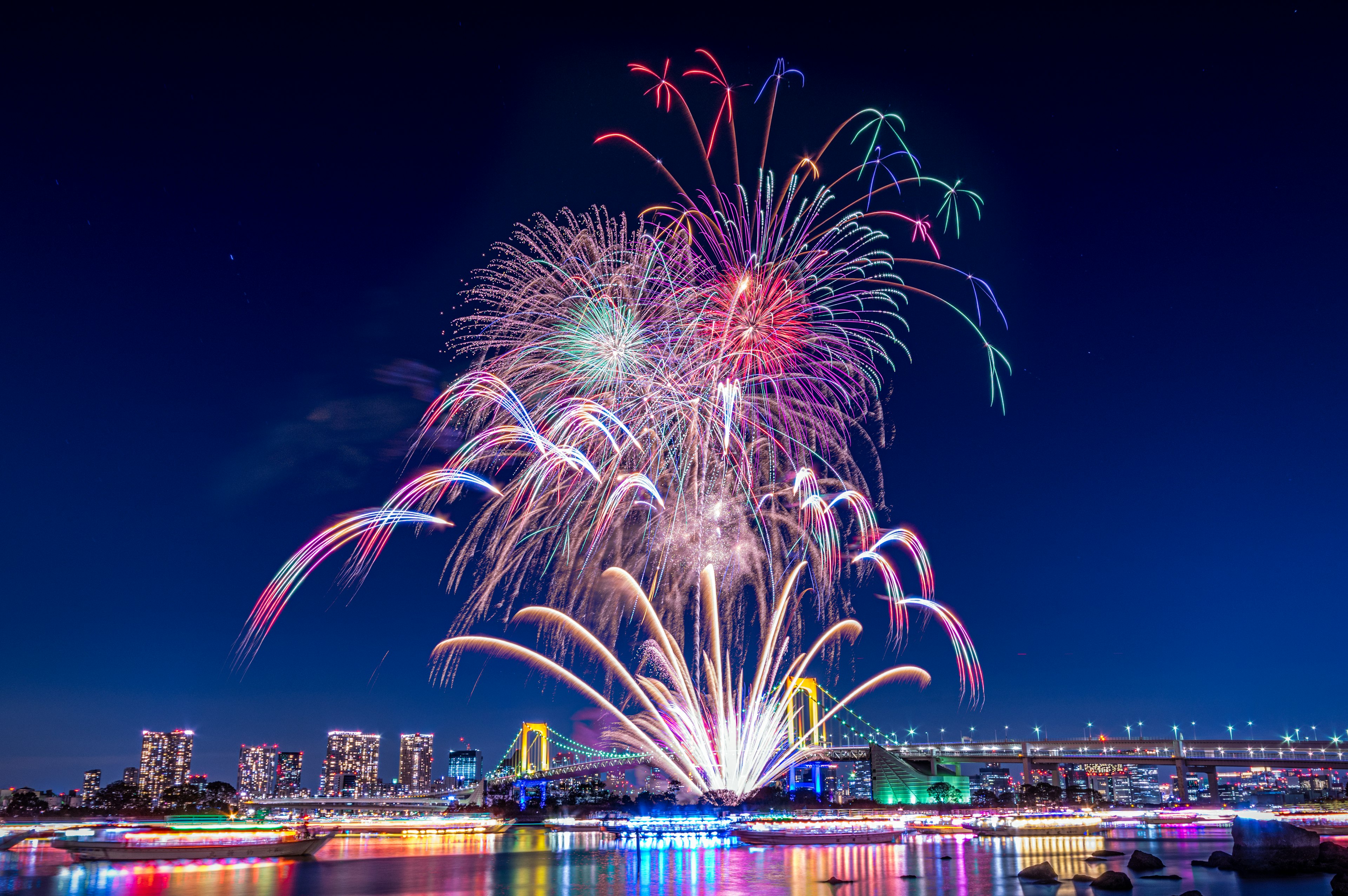 Tokyo Odaiba Rainbow Fireworks display 2017, Rainbow Bridge in seven colors lit.