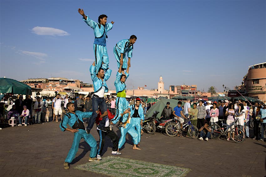 Acrobatic performers at Djemaa El Fna square in Marrakesh, Morocco