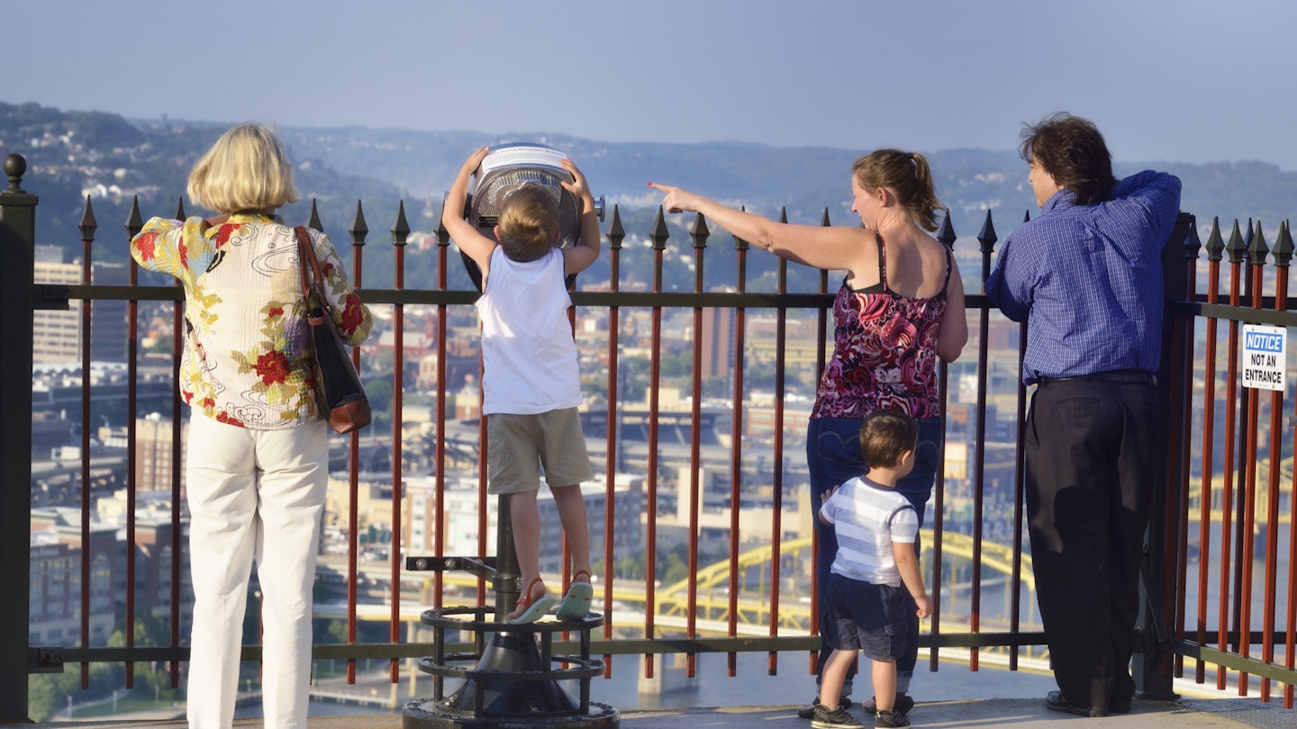 "Pittsburg, USA - July 24, 2012: Family enjoying panoramic view of Downtown Pittsburgh , PA"