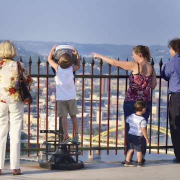 "Pittsburg, USA - July 24, 2012: Family enjoying panoramic view of Downtown Pittsburgh , PA"