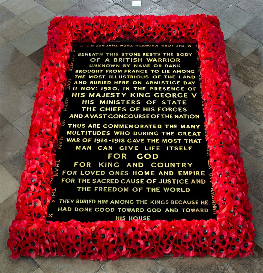 Grave of the Unknown Warrior A black gravestone with gold writing surrounded by red poppies marking the Grave of the Unknown Warrior