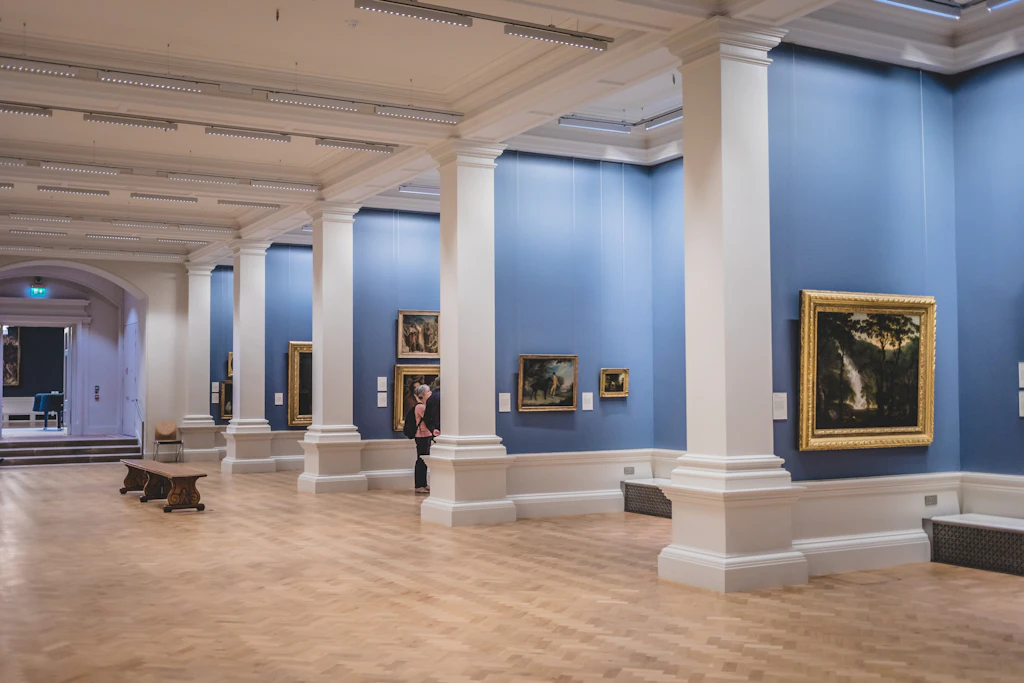 shutterstockRF_1343923325.jpg Paintings displayed on blue walls in the National Gallery of Ireland