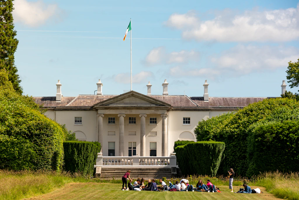 shutterstockRF_1510488590.jpg Students in front of Aras an Uachtarain - the official residence of the President of Ireland, located in Phoenix Park