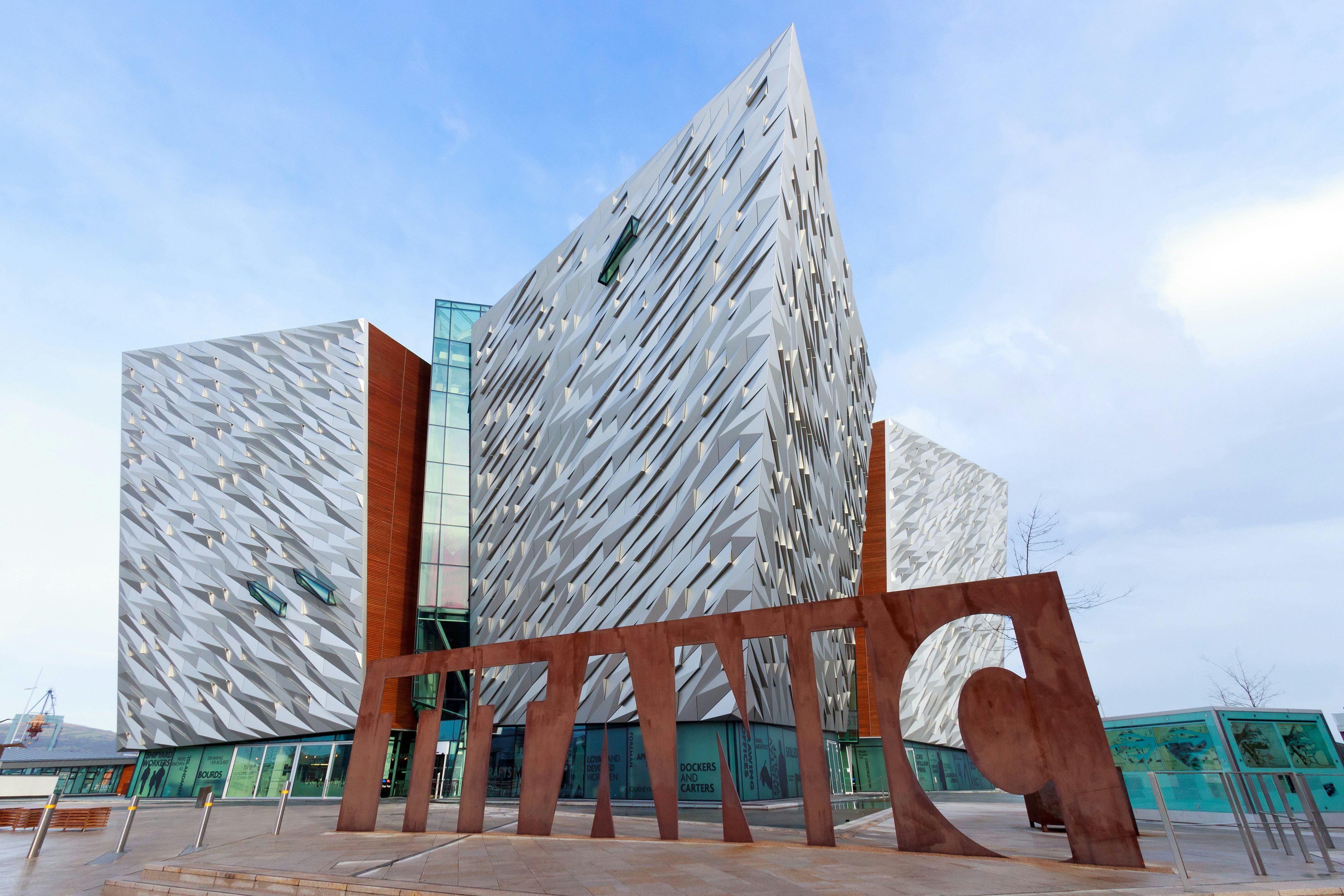 BELFAST, NORTHERN IRELAND - FEB 9, 2014: The Titanic visitor attraction and a monument in Belfast, Northern Ireland. Opened in 2012, this is the Titanic sign in front of the entrance.