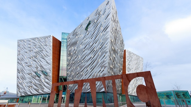 BELFAST, NORTHERN IRELAND - FEB 9, 2014: The Titanic visitor attraction and a monument in Belfast, Northern Ireland. Opened in 2012, this is the Titanic sign in front of the entrance.