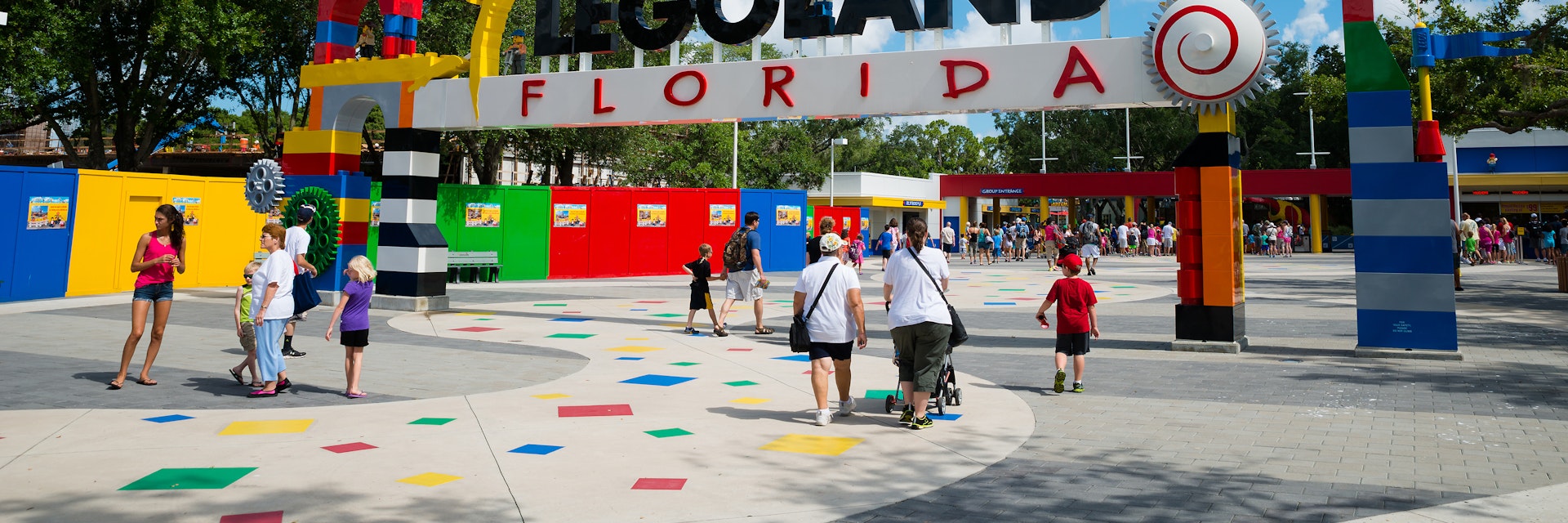WINTER HAVEN, FL - June 18, 2014: Visitors pass through the entrance to Legoland Florida in Winter Haven, FL, on June 18, 2014.