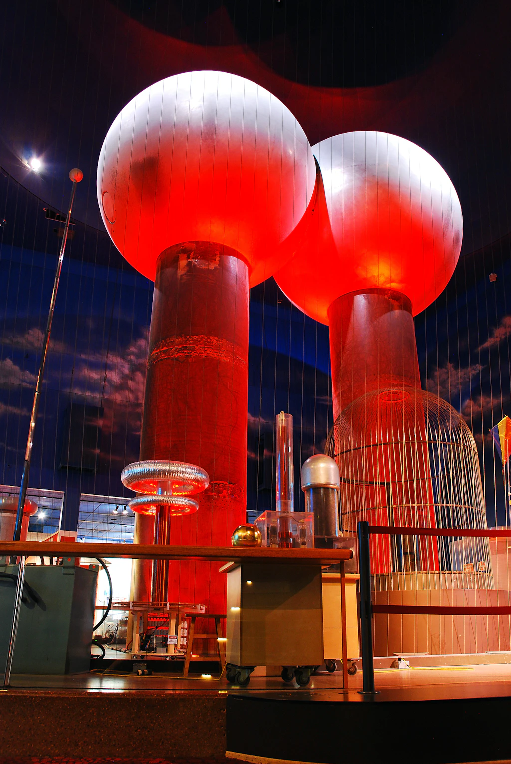 Van der Graaf generator, Museum of Science, Boston Two huge balls rise above an auditorium.