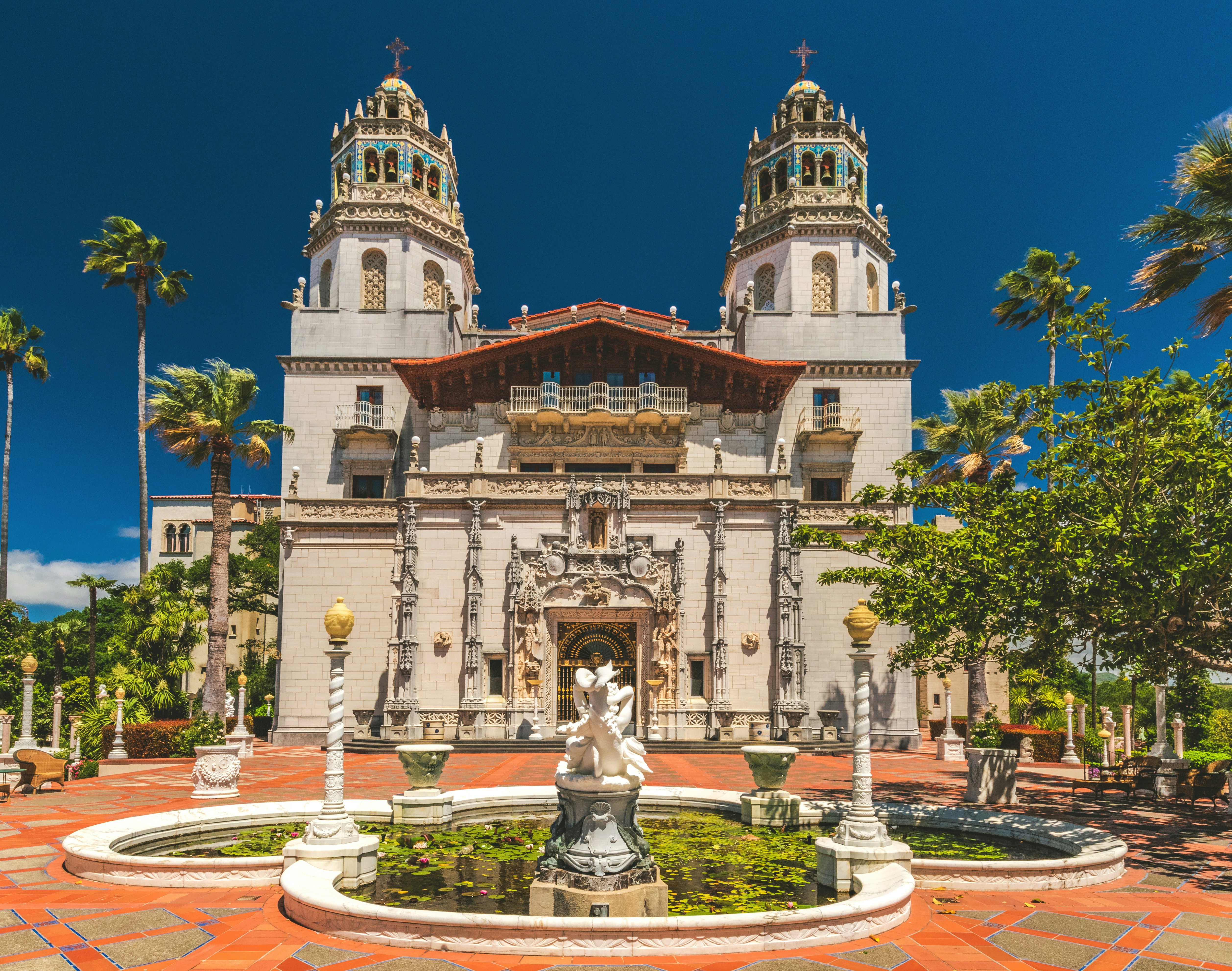 San Simeon, California / USA - May 12, 2018: Exterior view of Hearst Castle, William Randolph Hearst's extravagant coastal hilltop estate designed by architect Julia Morgan over 28 years.; Shutterstock ID 1297759909; your: Meghan O'Dea; gl: 65050; netsuite: Online Editorial; full: POI