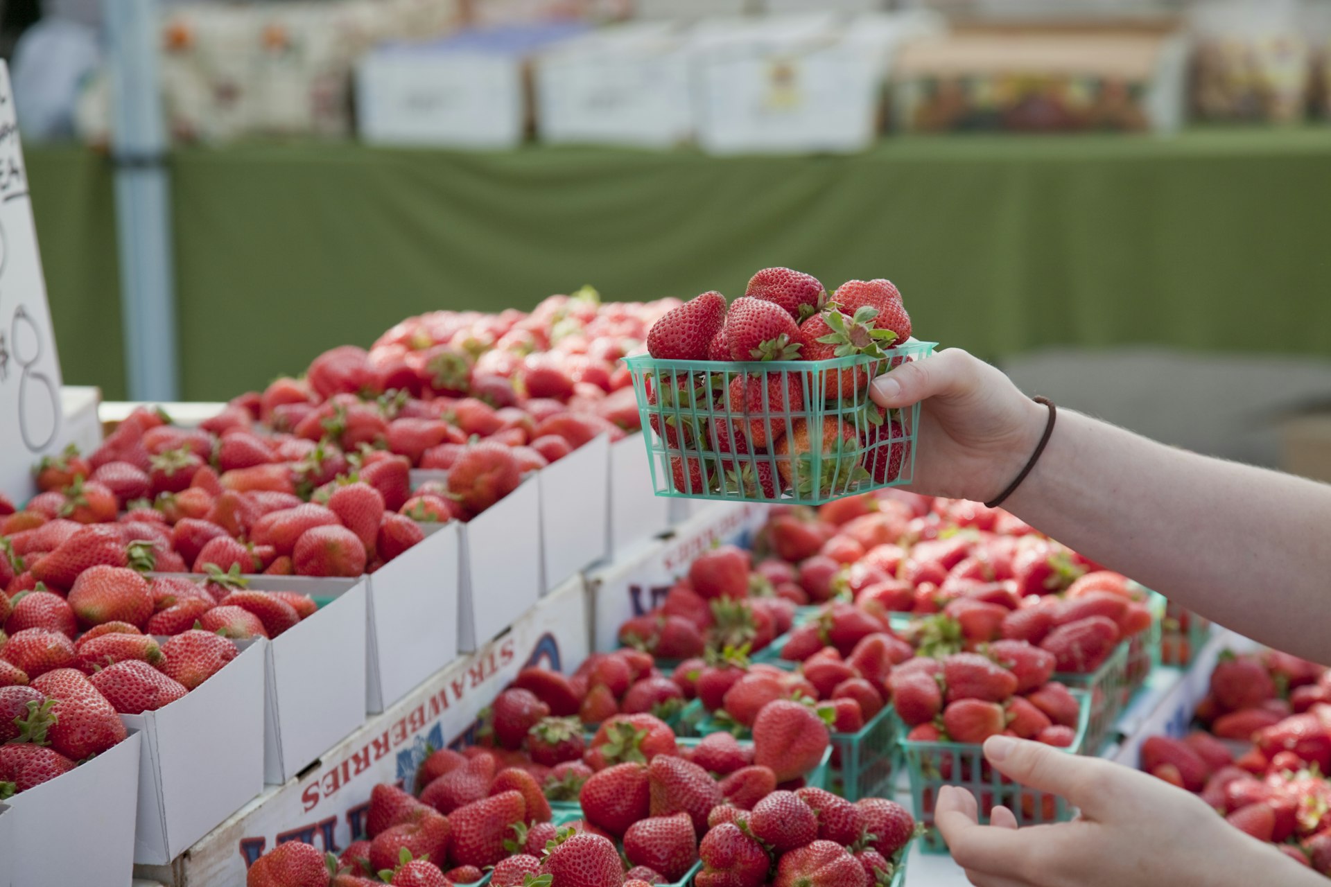 Organic Strawberries for sale at Farmer's Market, Culver City, Los Angeles, California, USA