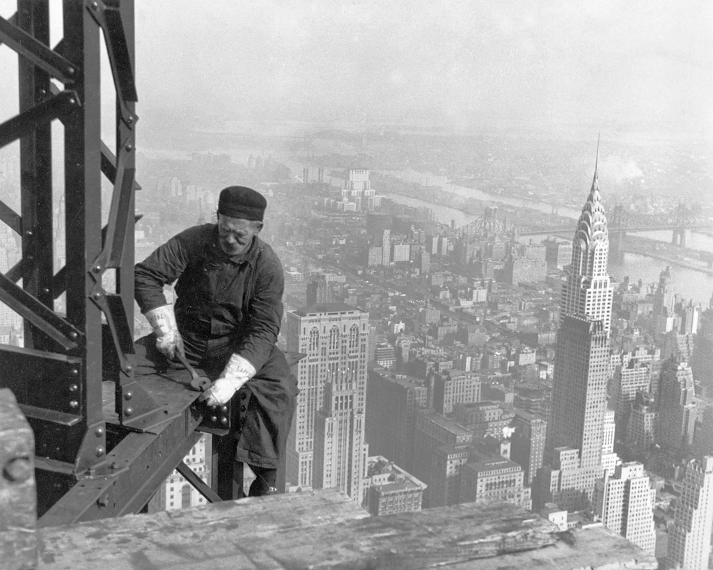 A construction worker on the Empire State Building. A construction worker on the Empire State Building.