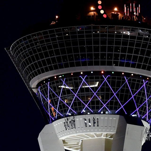 LAS VEGAS, NEVADA - DECEMBER 21: Jupiter (L) and Saturn appear about one-tenth of a degree apart during an astronomical event known as a Great Conjunction to the left of The STRAT Hotel, Casino & SkyPod on December 21, 2020 in Las Vegas, Nevada. The planets, which remain about 450 million miles apart in space, have not appeared this close together from Earth's vantage point since 1623, and it's been nearly 800 years since the alignment occurred at night. The conjunction, which occurs on the night of the winter solstice by coincidence, has become known popularly as the "Christmas Star." The gas giants will not appear this close together again until 2080. (Photo by Ethan Miller/Getty Images)