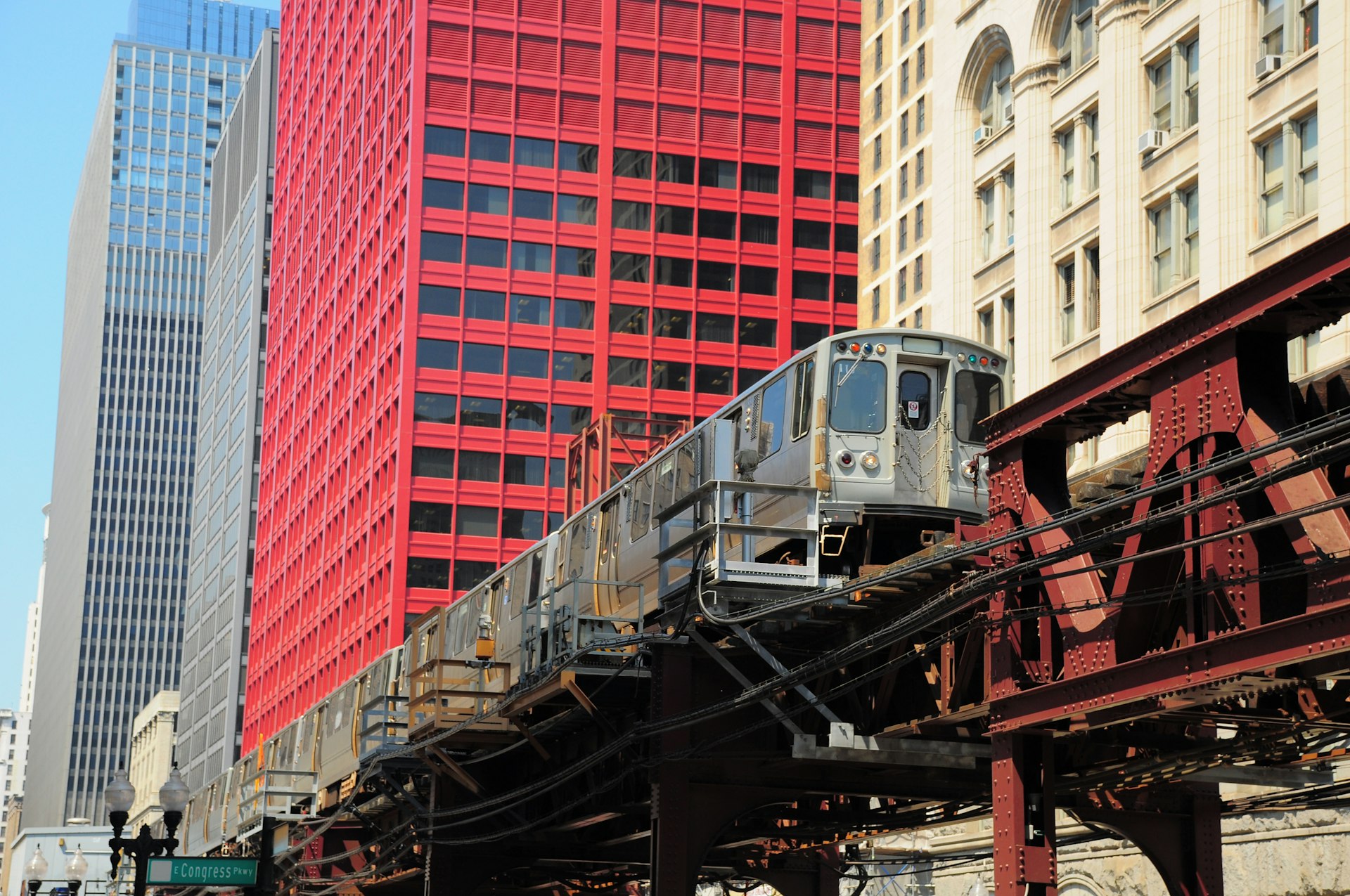 A L train passes office towers in the downtown Loop area of Chicago