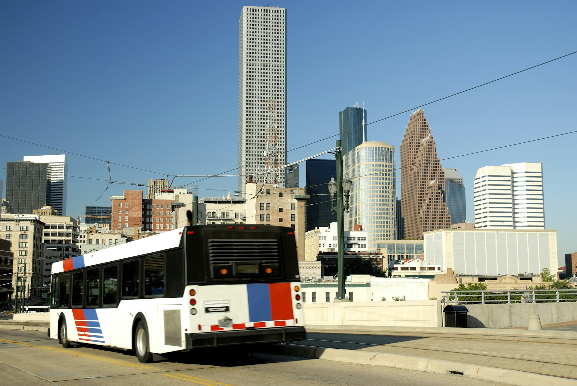 Metro Bus Going Into Downtown Houston Modern City Skyline Skyscrapers