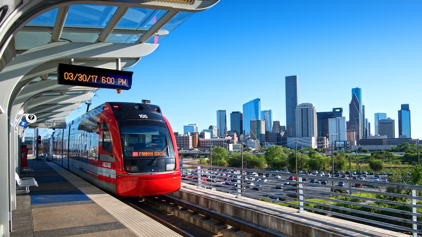 MetroRail Red Line makes a stop at the elevated Burnett Transit Center just outside of downtown Houston. The light rail system is the seond most-travelled metro in the Southern United States.
