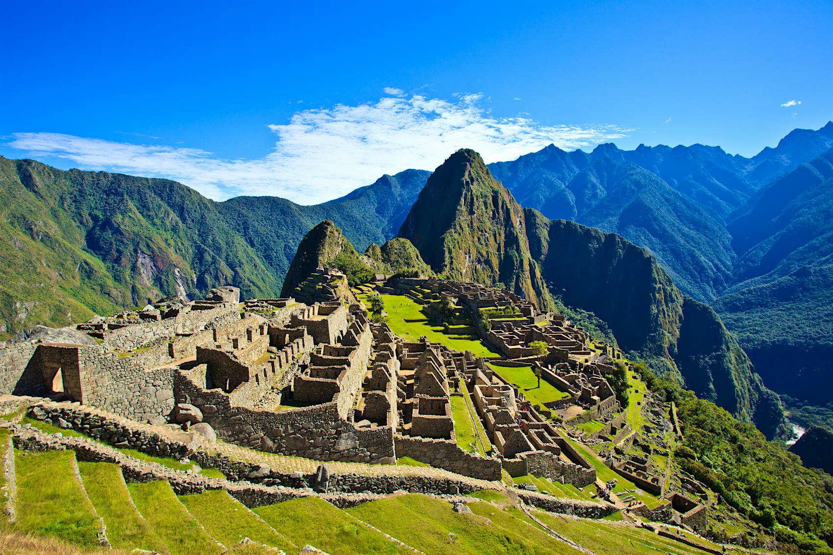 ''Machu Picchu is a 15th century Inca site located 2,430 metres above sea level on a mountain ridge above the Urubamba Valley. Machu Picchu was declared a Peruvian Historical Sanctuary.''