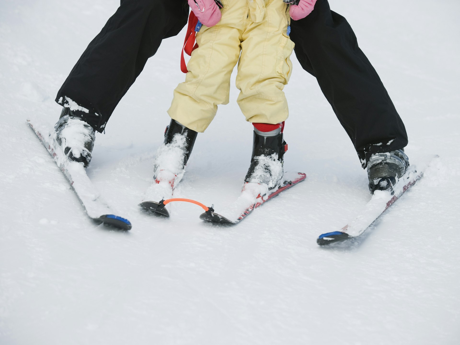 Parent and child skiing