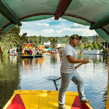 Trajinera or punt on the canals and floating gardens of Xochimilco Mexico City