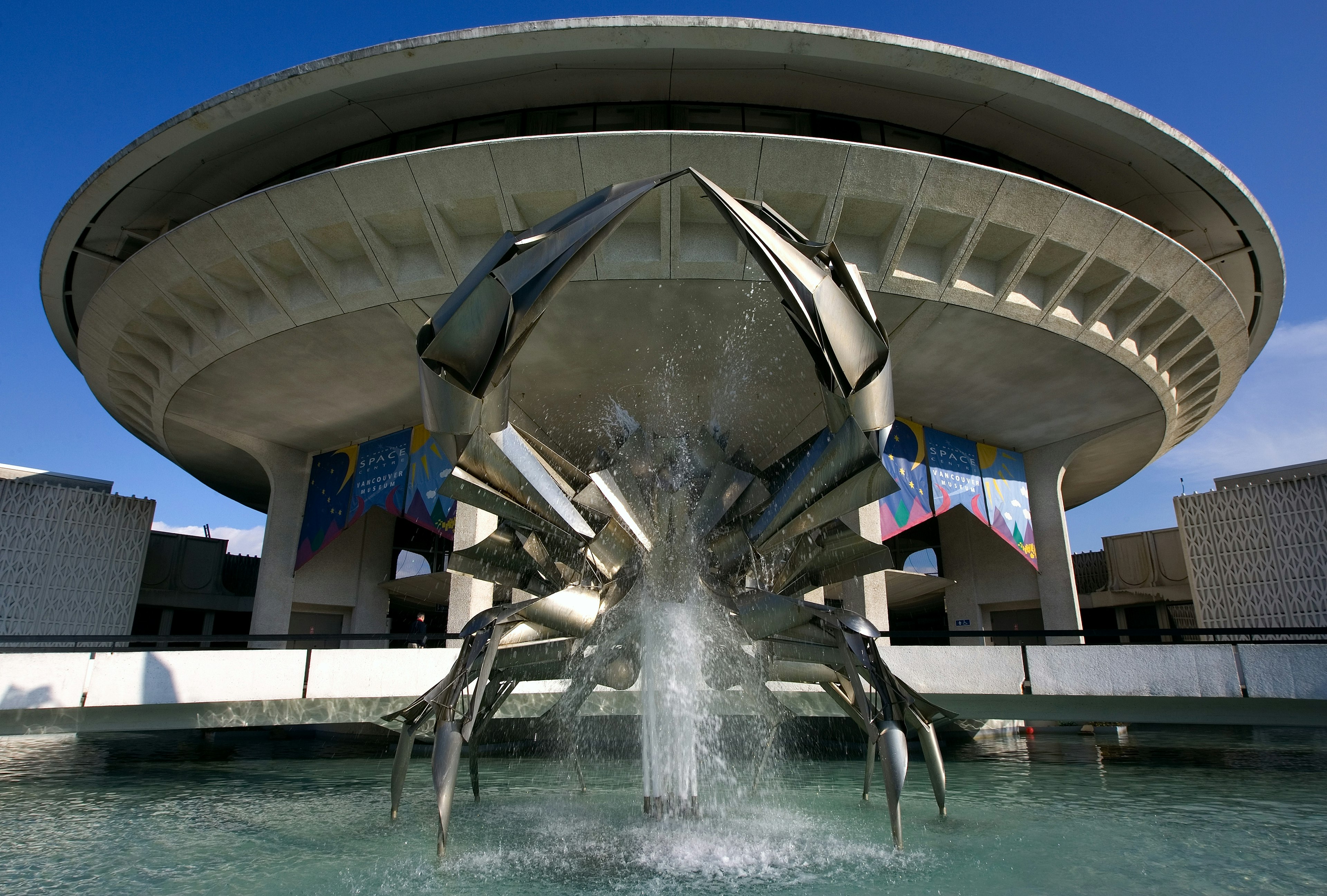 The giant crab sculpture stands guard in front of the H.R. MacMillan Space Centre