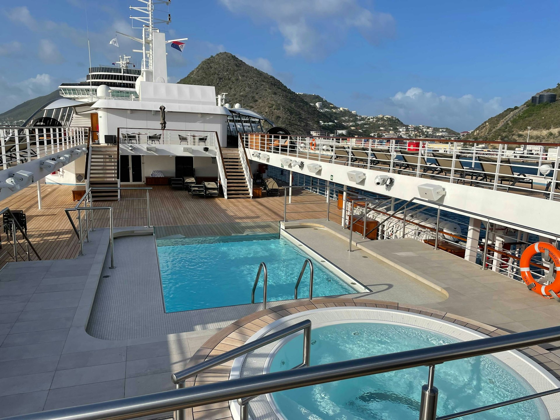 A hot tub and pool on a cruise ship. 