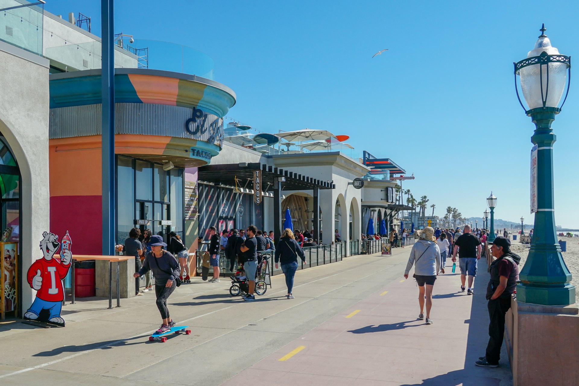 The Mission Beach boardwalk, a concrete walkway shared by walkers and bicyclists.