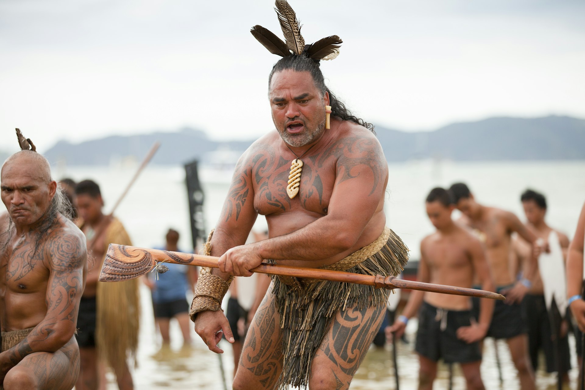 Maori warriors with tattoos, celebrating Waitangi Day, the anniversary of the treaty of Waitangi between the British government and the maori 