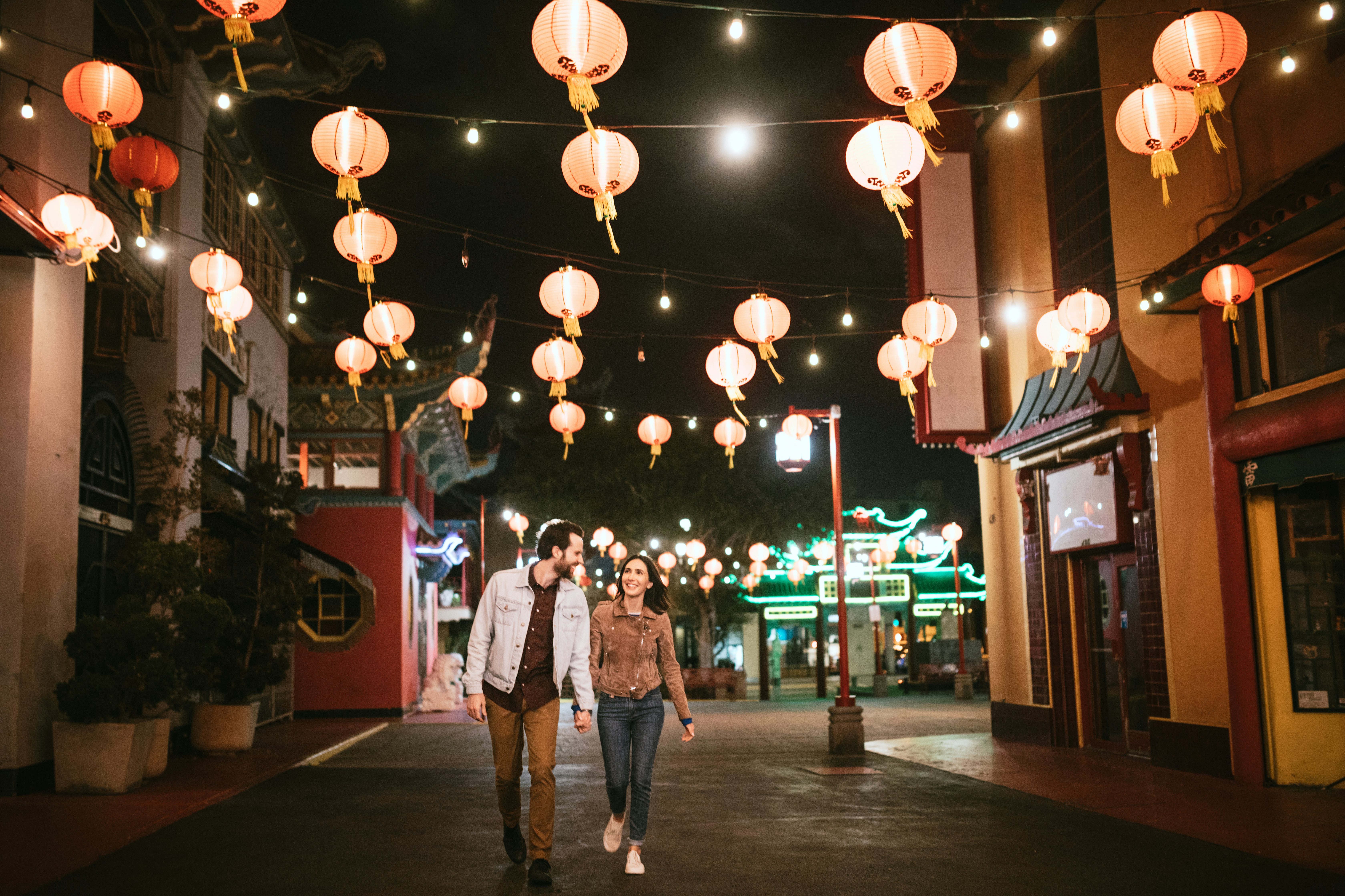 Happy Couple Exploring Chinatown in Downtown Los Angeles At Night