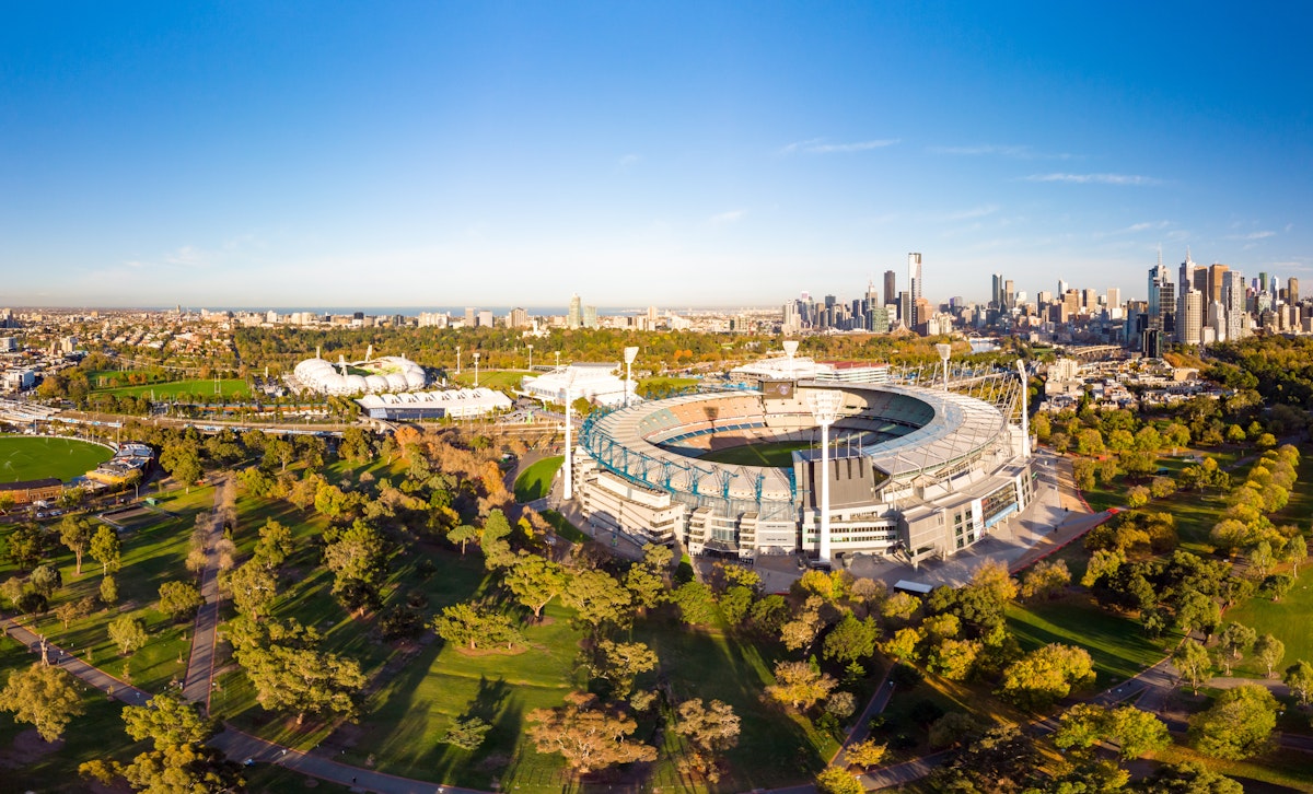 MELBOURNE, AUSTRALIA - MAY 30: Melbourne's famous skyline with Melbourne Cricket Ground stadium in the foreground on a cool autumn morning in Melbourne, Victoria, Australia on May 30th 2018.