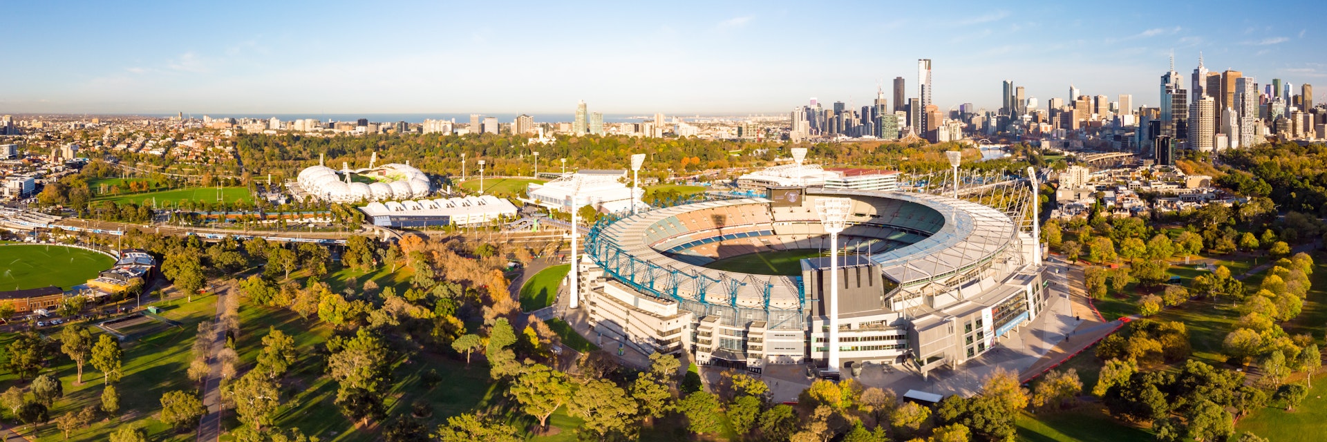 MELBOURNE, AUSTRALIA - MAY 30: Melbourne's famous skyline with Melbourne Cricket Ground stadium in the foreground on a cool autumn morning in Melbourne, Victoria, Australia on May 30th 2018.