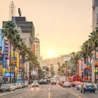 LOS ANGELES - DECEMBER 18, 2013: View of Hollywood Boulevard at sunset. In 1958, the Hollywood Walk of Fame was created on this street as a tribute to artists working in the entertainment industry.