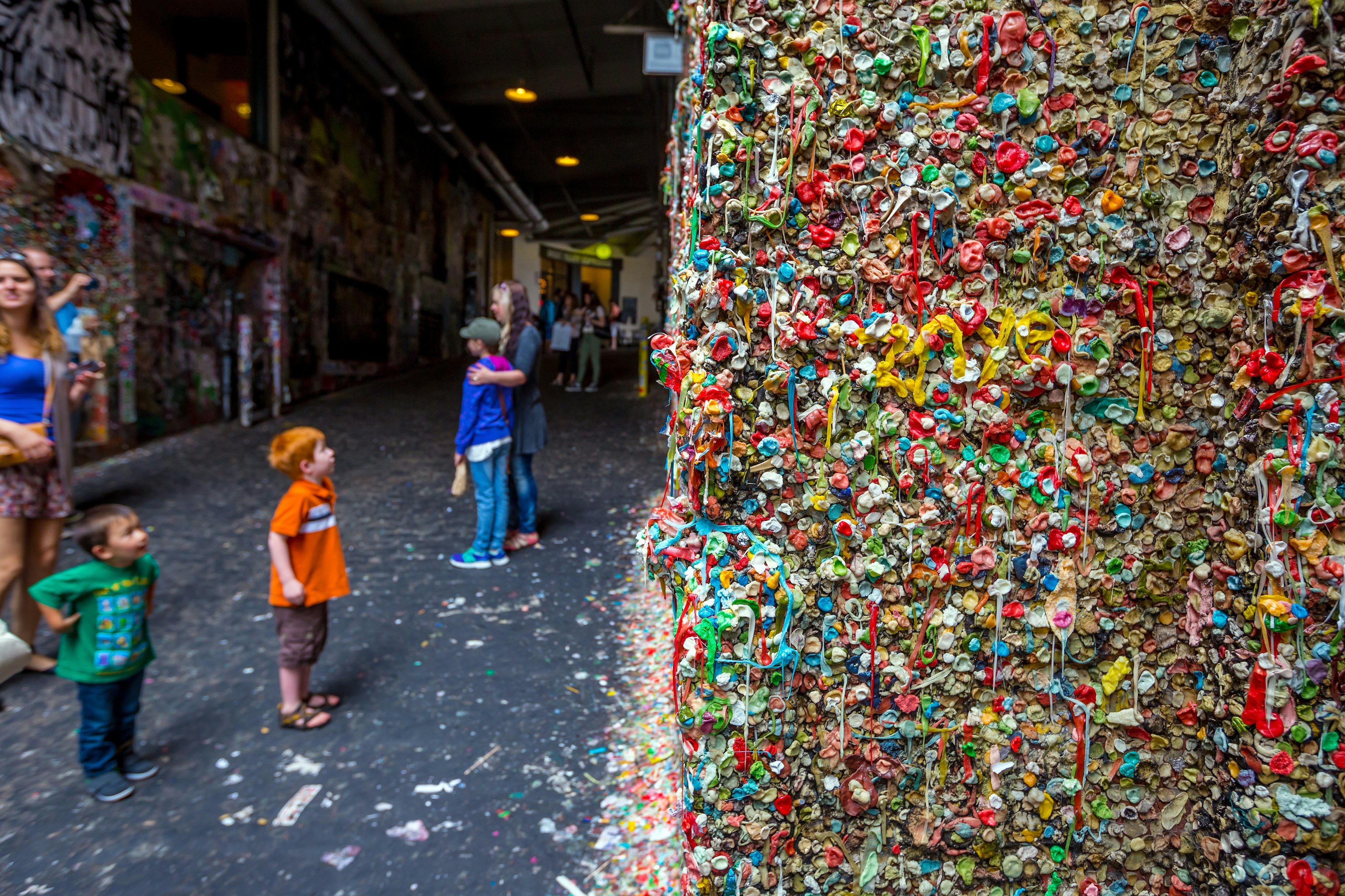 Kids playing near Seattle's famous Gum Wall