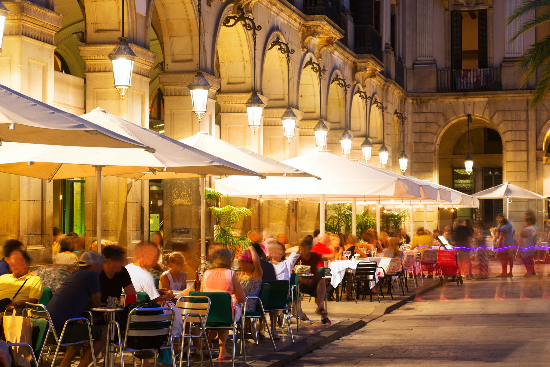 Outdoor restaurants at Placa Reial in night