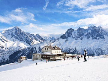 The winter view on the montains and ski lift station in French Alps near Chamonix Mont-Blanc