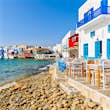 White tavern buildings on the coast in the Little Venice part of Mykonos Town.